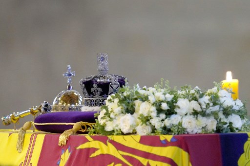 All about the dazzling crown that sits on the queen’s casket