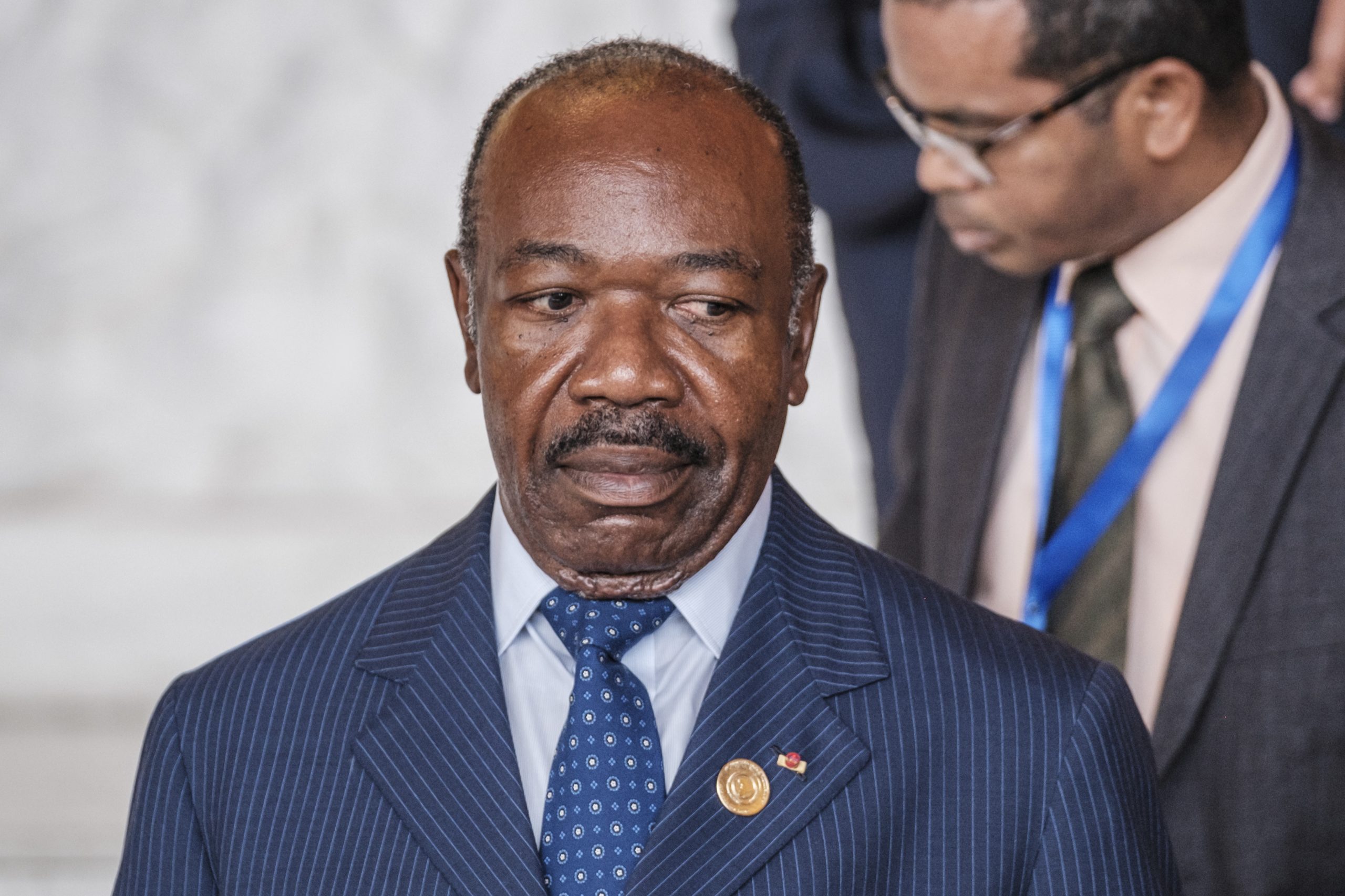 Gabon cuts presidential term to five years before election