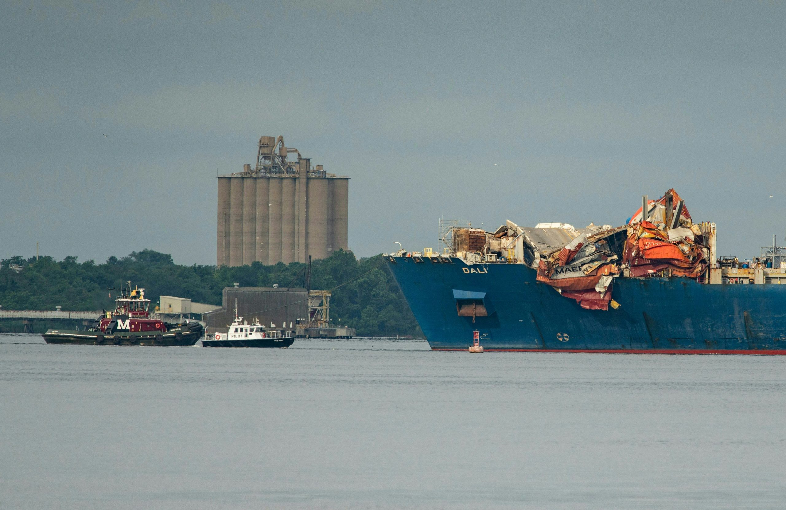 Cargo ship that destroyed Baltimore bridge towed to port