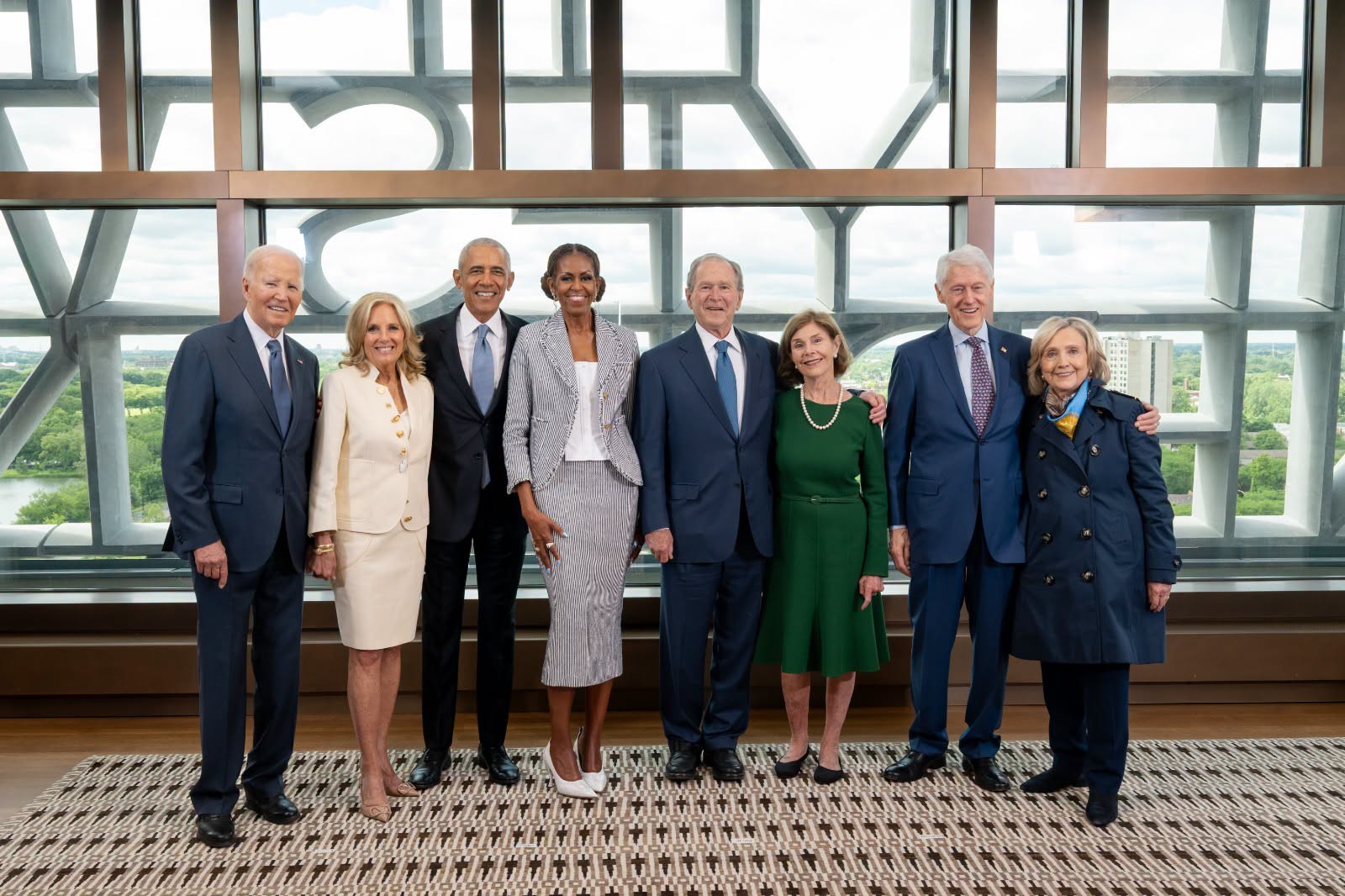 Ex-presidents and stars, but no Trump, turn out for Obama Library