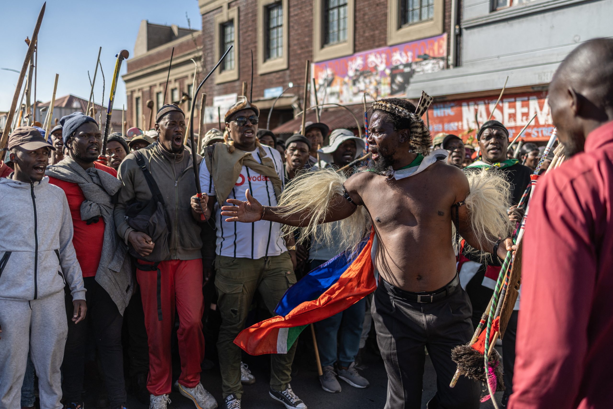 S.African anti-migrant protesters march after Ramaphosa warns vigilantes