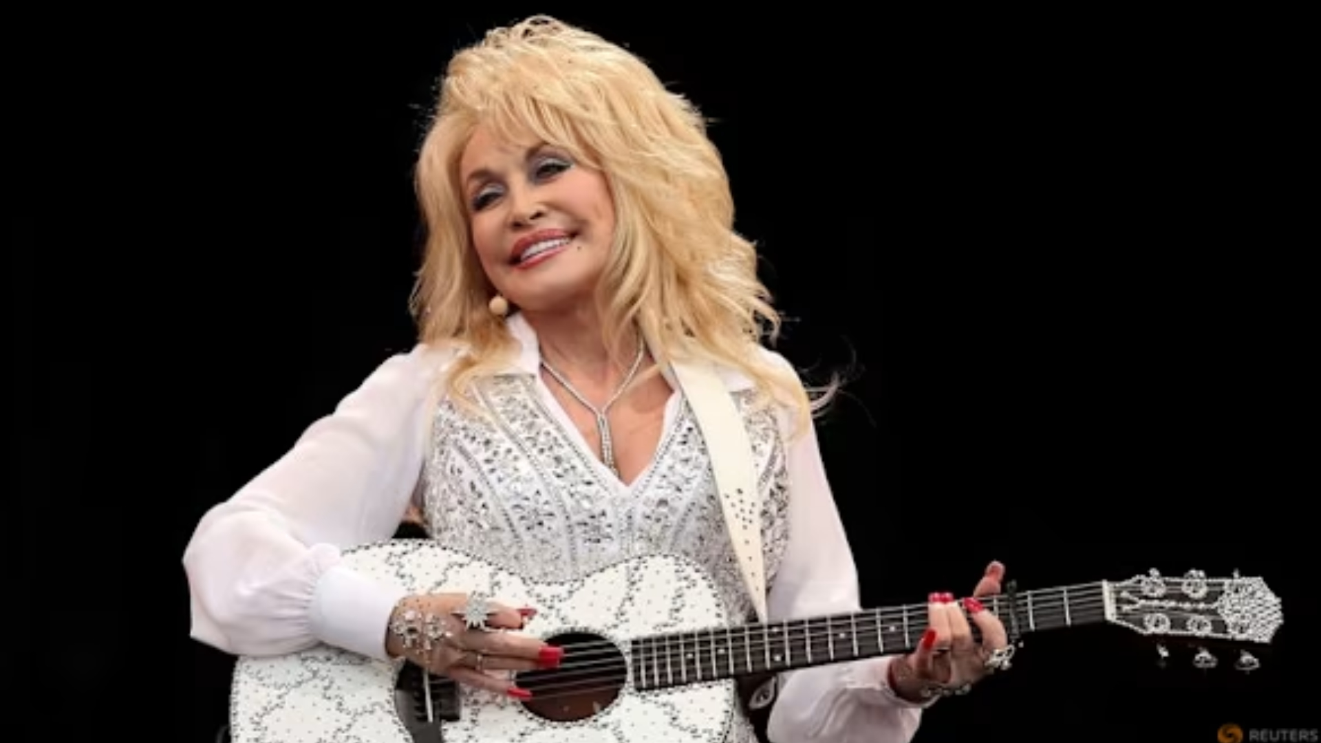 WHO Is Dolly Parton?